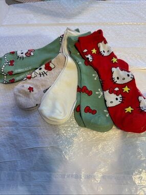 hello Kitty, five pair new socks 2 green 1 red 1white 1 taupe up to a size 9 NEW